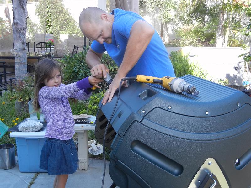 assembling a composter in the home grown fun garden